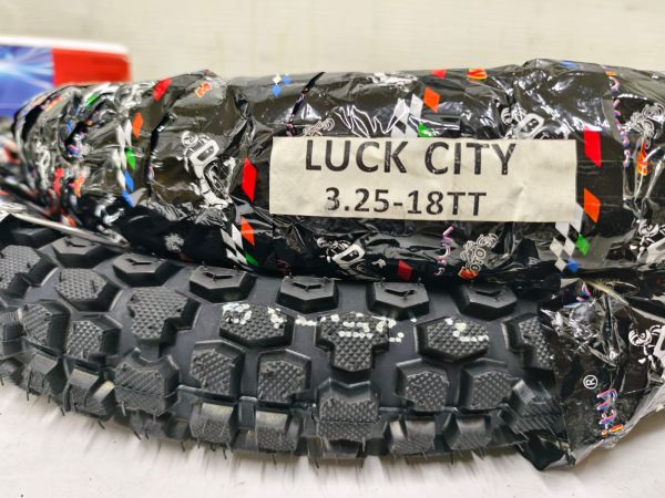 Покрышка 3.25-18